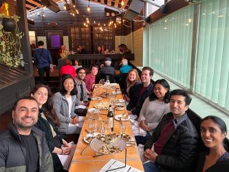 A celebratory dinner at an outdoor terrace.